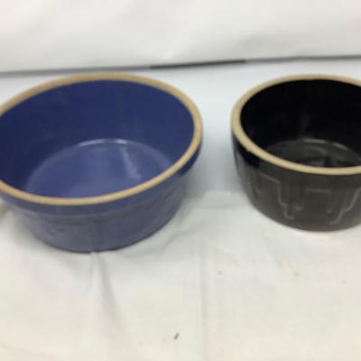 Sale Photo Thumbnail #40: You get two pottery mixing/ serving bowls.  Brown and blue in good condition.  Blue one has USA marked on bottom.