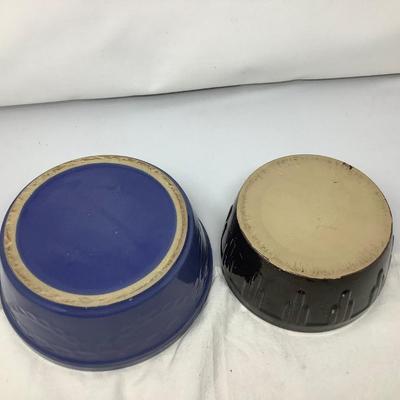 Sale Photo Thumbnail #44: You get two pottery mixing/ serving bowls.  Brown and blue in good condition.  Blue one has USA marked on bottom.