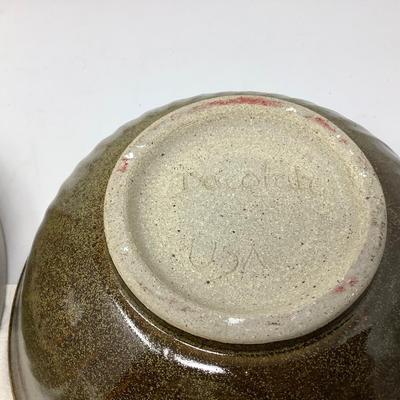 Sale Photo Thumbnail #52: You get two pottery mixing / serving bowls.  Gray and brown both in good condition. Brown one is signed by the potter.