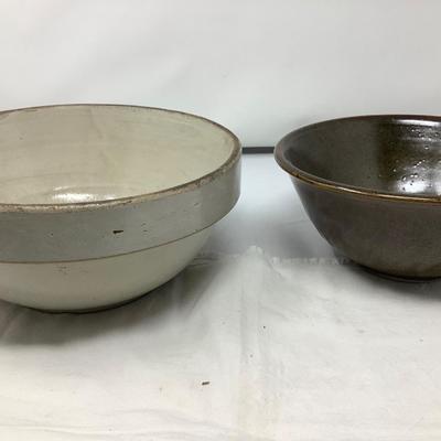 Sale Photo Thumbnail #48: You get two pottery mixing / serving bowls.  Gray and brown both in good condition. Brown one is signed by the potter.
