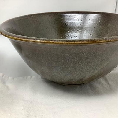 Sale Photo Thumbnail #49: You get two pottery mixing / serving bowls.  Gray and brown both in good condition. Brown one is signed by the potter.