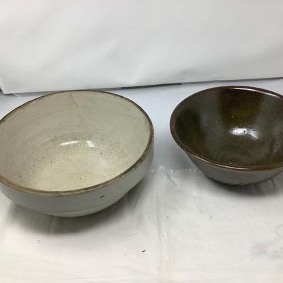 Sale Photo Thumbnail #47: You get two pottery mixing / serving bowls.  Gray and brown both in good condition. Brown one is signed by the potter.
