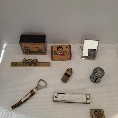 Small trinket boxes, harmonica.,Stamp holder,advertising mirror, whistle