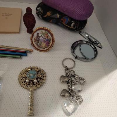 Feminine Variety, small handheld mirror needs bead repair.