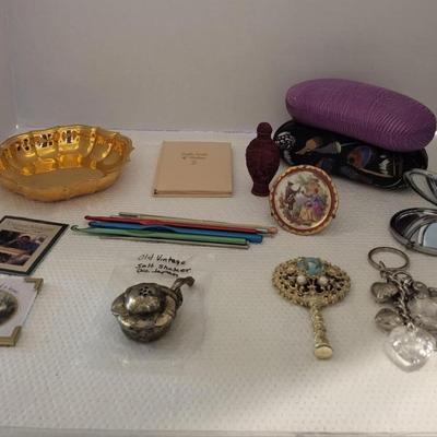 Feminine Variety, small handheld mirror needs bead repair.