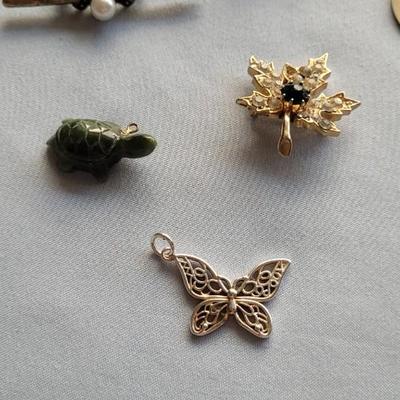 PINS, CHARMS, PADLOCKS AND MORE
