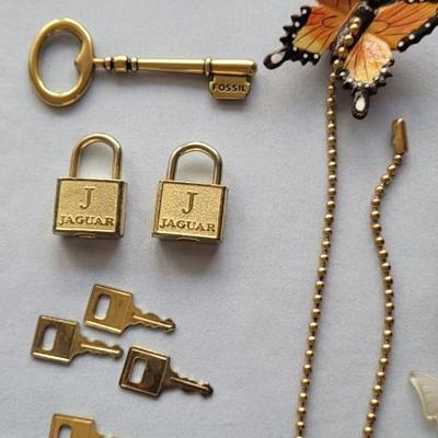 PINS, CHARMS, PADLOCKS AND MORE