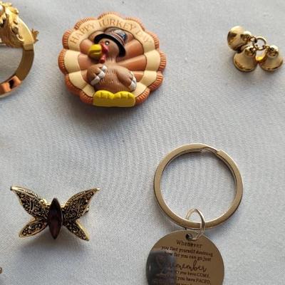 PINS, CHARMS, PADLOCKS AND MORE