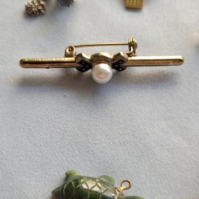 PINS, CHARMS, PADLOCKS AND MORE
