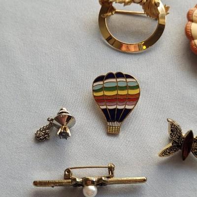 PINS, CHARMS, PADLOCKS AND MORE