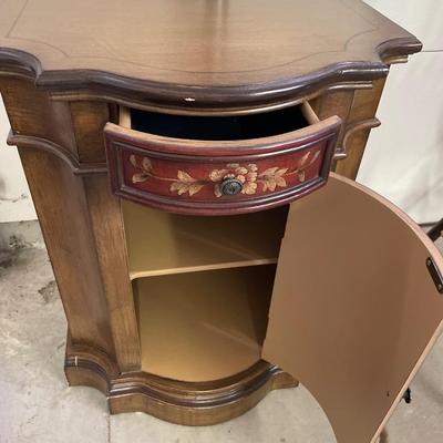Cute cabinet with red floral front