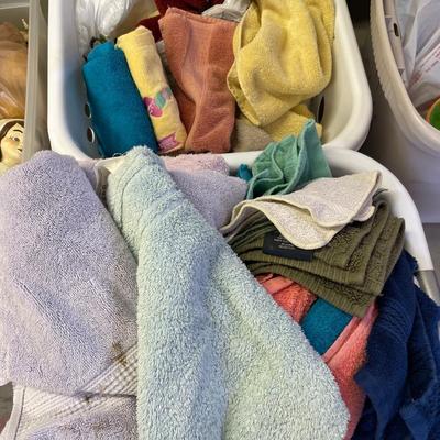 2 laundry basket, baskets of towels