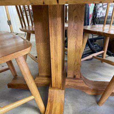 Self contained leaf dining table and chairs