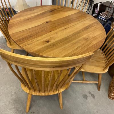 Self contained leaf dining table and chairs