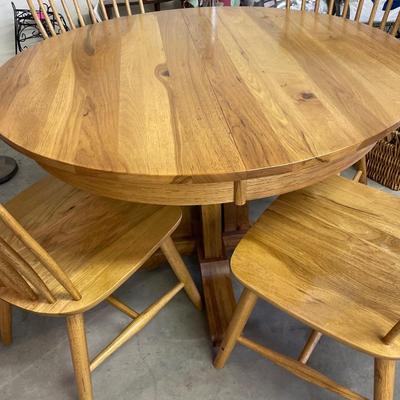 Self contained leaf dining table and chairs