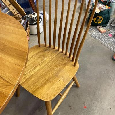Self contained leaf dining table and chairs