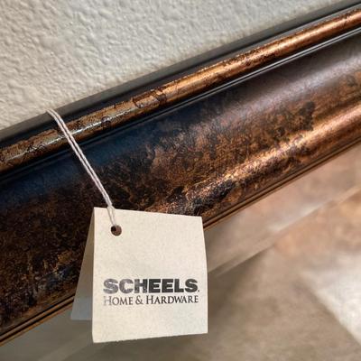 Scheels mirror and rug