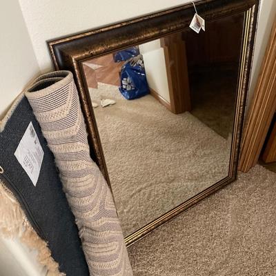 Scheels mirror and rug