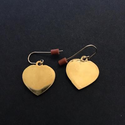 Gold tone cherub dangle earrings