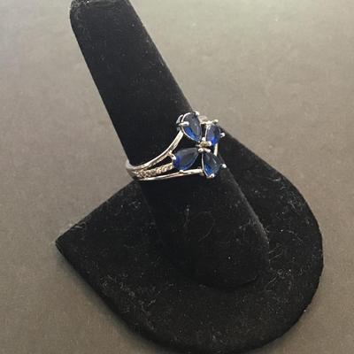 Silver tone sapphire flower ring