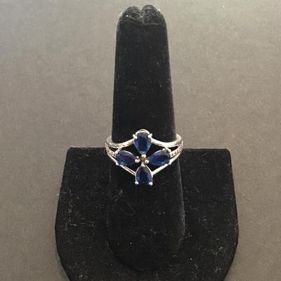 Silver tone sapphire flower ring
