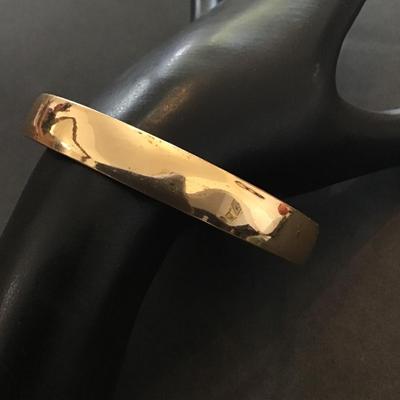 Gold tone bangle bracelet