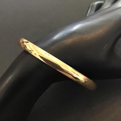 Gold tone bangle bracelet