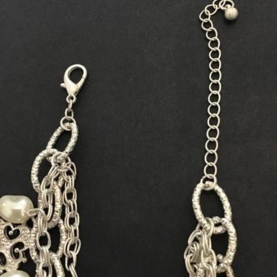 Cute silver tone charm bracelet