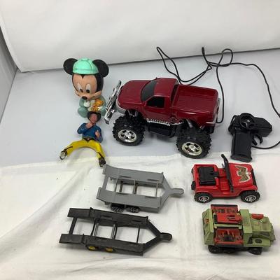 Sale Photo Thumbnail #104: 2 Tonka trailers, Jeep, Matchbox Car, Remote control truck, Mickie, Cowboy