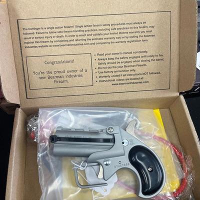 Sale Photo Thumbnail #137: Action: Single-action over/under derringer

Barrel Length: 2.75 inches

Overall Length: 4.65 inches

Height: Approximately 3 inches

Width: Approximately 1 inch

Weight: 14 oz

Capacity: 2-round double-barrel

Frame Material: Alloy

Sights: Fixed front bl