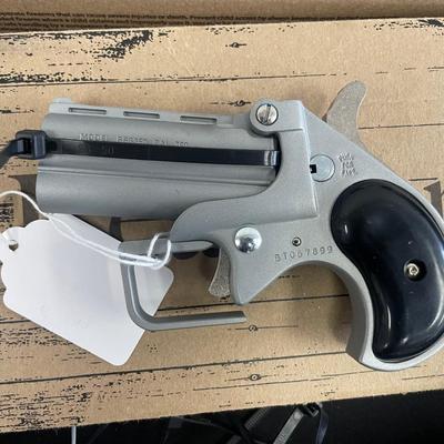 Sale Photo Thumbnail #136: Action: Single-action over/under derringer

Barrel Length: 2.75 inches

Overall Length: 4.65 inches

Height: Approximately 3 inches

Width: Approximately 1 inch

Weight: 14 oz

Capacity: 2-round double-barrel

Frame Material: Alloy

Sights: Fixed front bl