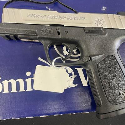 Sale Photo Thumbnail #151: MANUFACTURER: Smith and Wesson
FAMILY: Self Defense Series
MODEL: SD40 2.0
TYPE: Semi-Auto Pistol
ITEM GROUP: Centerfire Polymer Pistols
ACTION: Striker Fired
CALIBER/GAUGE: 40 S&W
FINISH: Stainless
FINISH TYPE: Stainless Steel
FRAME: Polymer Fra