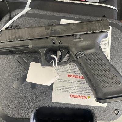 Sale Photo Thumbnail #158: MANUFACTURER: GLOCK
FAMILY: G22 Series
MODEL: G22 G5 MOS
TYPE: Semi-Auto Pistol
ITEM GROUP: Centerfire Polymer Pistols
ACTION: Safe Action
CALIBER/GAUGE: 40 S&W
FINISH: nDLC
FINISH TYPE: Black
FRAME: Polymer Frame
BARREL: 4.49"
OVERALL LENGTH: 