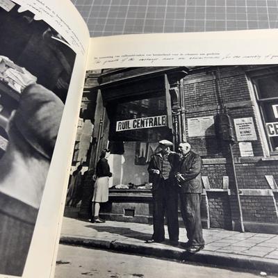 Sale Photo Thumbnail #170: Published only two years after Holland’s liberation from the Nazis, with over a 100 photos and an introduction by Max Nord..."AMSTERDAM tijdens de hongerwinter 1944-45" (AMSTERDAM during the hunger winter 1944-45)...Detailing the harsh winter and Gaeman