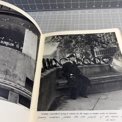 Sale Photo Thumbnail #169: Published only two years after Holland’s liberation from the Nazis, with over a 100 photos and an introduction by Max Nord..."AMSTERDAM tijdens de hongerwinter 1944-45" (AMSTERDAM during the hunger winter 1944-45)...Detailing the harsh winter and Gaeman