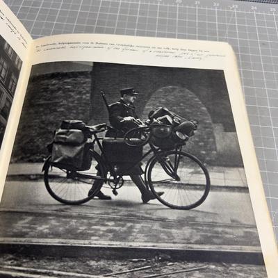 Sale Photo Thumbnail #171: Published only two years after Holland’s liberation from the Nazis, with over a 100 photos and an introduction by Max Nord..."AMSTERDAM tijdens de hongerwinter 1944-45" (AMSTERDAM during the hunger winter 1944-45)...Detailing the harsh winter and Gaeman