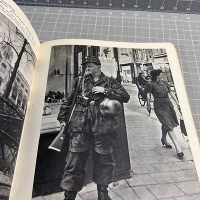 Sale Photo Thumbnail #172: Published only two years after Holland’s liberation from the Nazis, with over a 100 photos and an introduction by Max Nord..."AMSTERDAM tijdens de hongerwinter 1944-45" (AMSTERDAM during the hunger winter 1944-45)...Detailing the harsh winter and Gaeman
