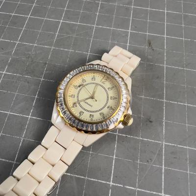 Sale Photo Thumbnail #490: PRETTY COOL. Does not appear to have ever been worn. Collectible. Heavy for a ladies watch. IMPRESSIVE! 