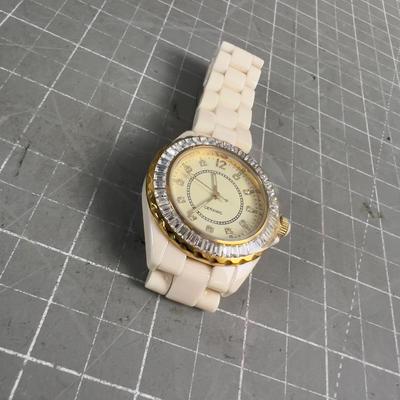 Sale Photo Thumbnail #487: PRETTY COOL. Does not appear to have ever been worn. Collectible. Heavy for a ladies watch. IMPRESSIVE! 