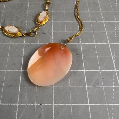 Sale Photo Thumbnail #543: Interesting. The Pendant seems much older that the other item. 