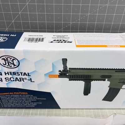 Sale Photo Thumbnail #2273: New in the box. But the box has some damage. The gun is complete and unharmed. 