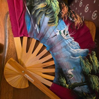 Set of four hand painted fans