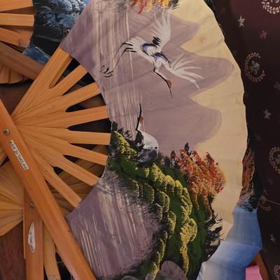 Set of four hand painted fans