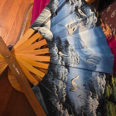 Set of four hand painted fans