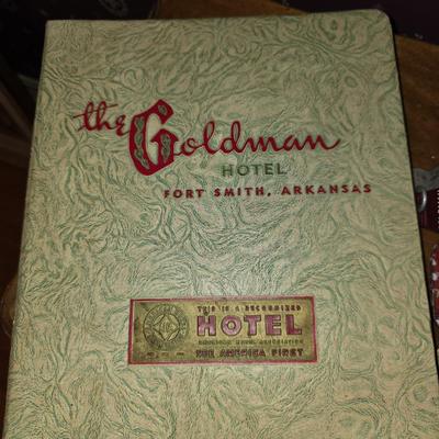 Goldman hotel sign in pen and telephone directory and room keys