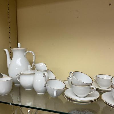 Sale Photo Thumbnail #225: 6 espresso cups and saucers 
2 cappacino cups and saucers 
Pot 8” tall 
Sugar and creamer
Shipping only with buy it now