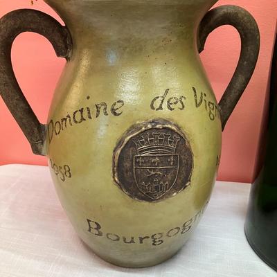 Sale Photo Thumbnail #26: 3 items: 1 oversized glass wine bottle, 1 pottery vase, 1 wooden carved wine bottle. Great decor pieces.