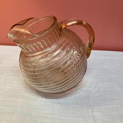 Sale Photo Thumbnail #32: 2 pieces: Pink depression glass pitcher and footed platter