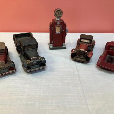 Sale Photo Thumbnail #34: 5 piece set of plaster vintage looking model cars and gas pump. Great for display!