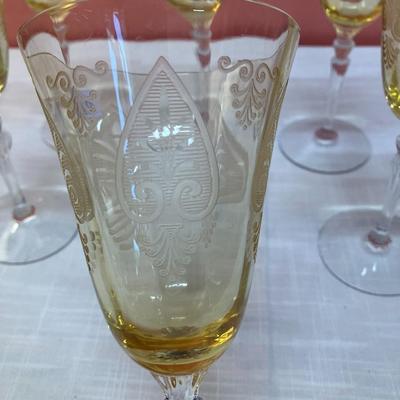 Sale Photo Thumbnail #71: Amazing pieces of Trojan Topaz designed Fostoria glassware, produced 1929-1936. Gorgeous yellow topaz color and clarity. Some pieces may have minor chips due to age. Gorgeous etched design. 
Set includes: 7 wine glasses